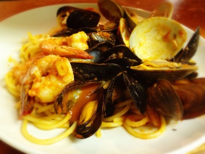 seafood spaghetti: 3 shrimp, 2 little neck clams, mussels and calamari in a tomato sauce