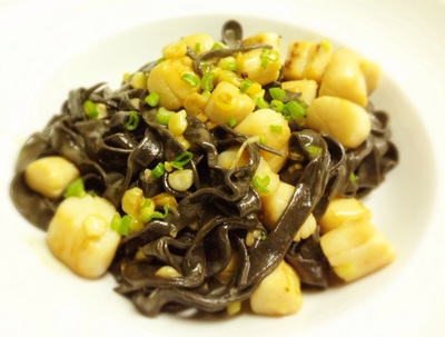 black squid ink house made pasta with local peconic bay scallops, lemon beurre blanc and scallions