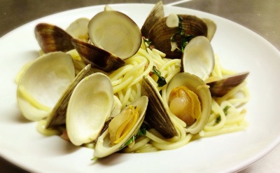 linguini with pinot grigio clam sauce, guanciale and basil